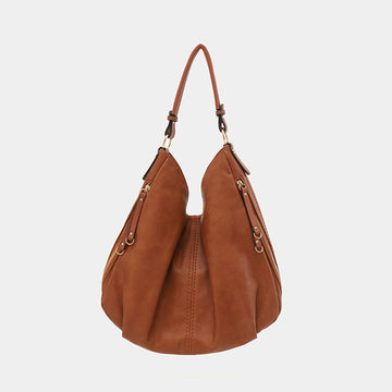 Valmont Handbag – The Bag That Commands Attention